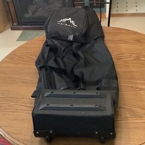 Himal Soft-Sided Black Golf Travel Bag, Heavy Duty with Wheels.